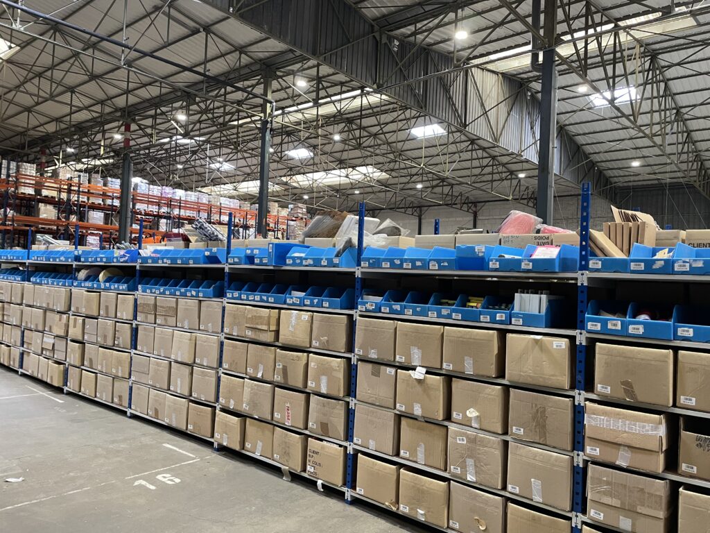 Warehouse where shelves and articles are placed